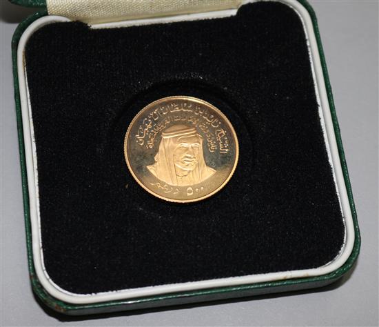 A United Arab Emirates commemorative gold coin.